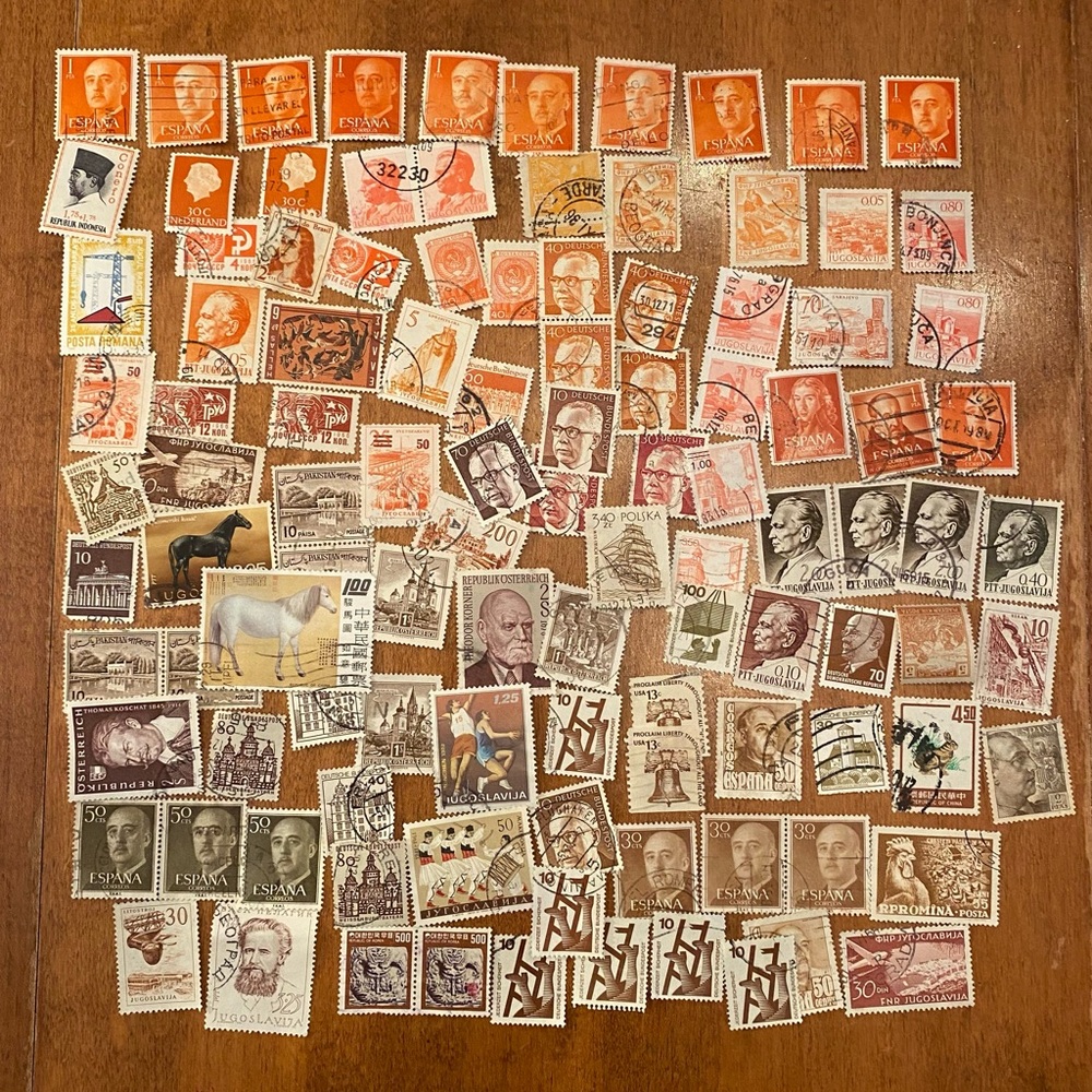Vintage international & USA Postal Stamps -over 100 -postmarked. Orange/Brown #2